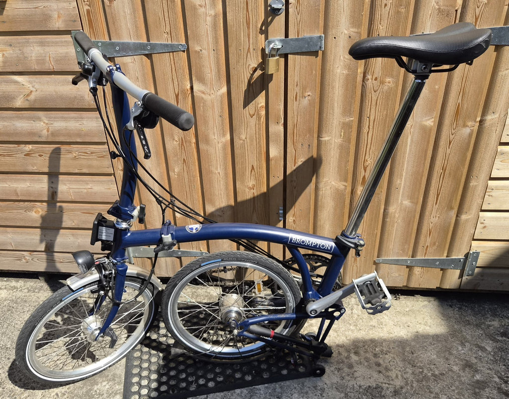 Brompton 16in Folding Bike Blue with Silver Mudguards Headlight Rear Light