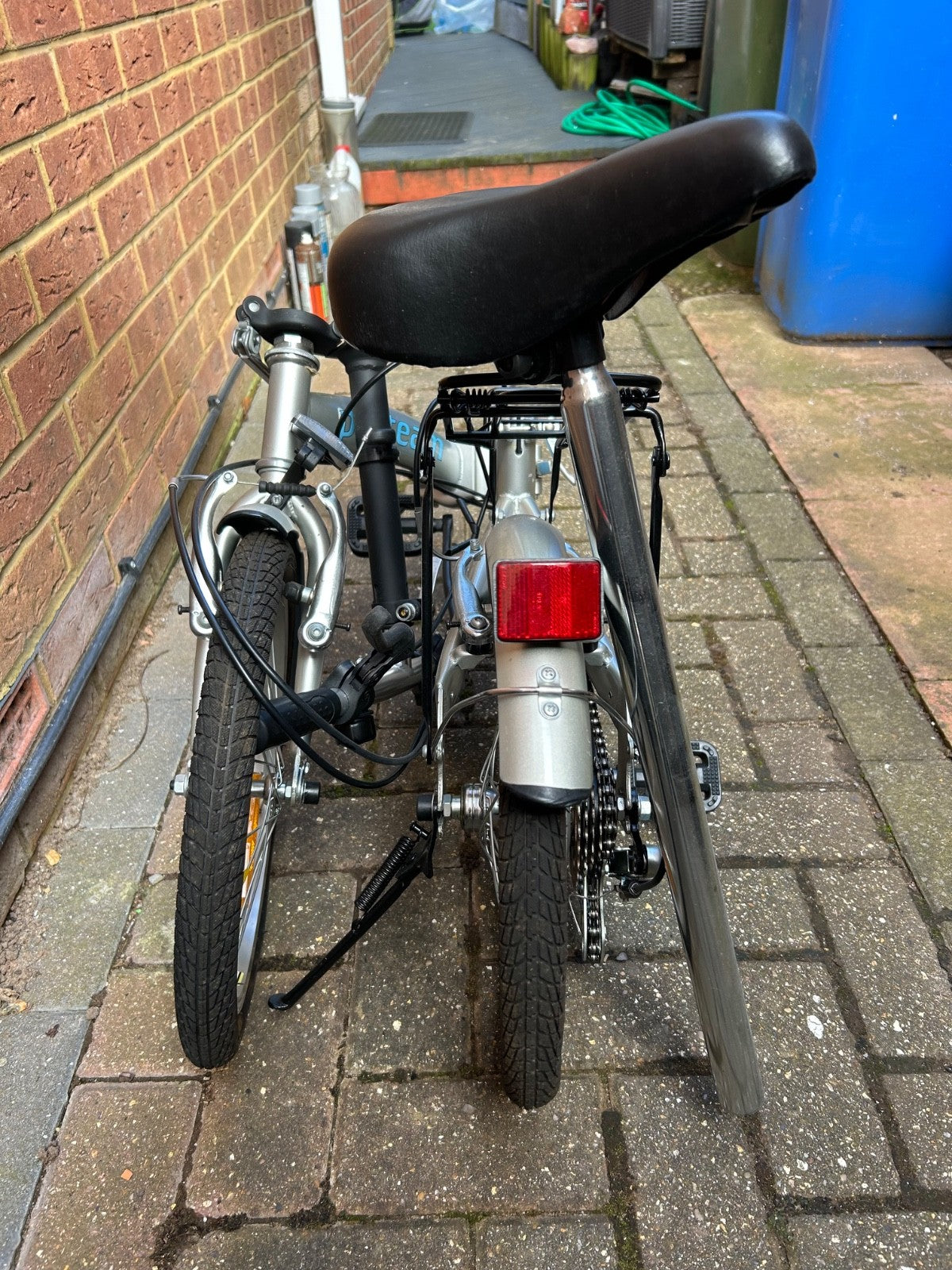 silver unisex fold up bike, aluminium alloy, never used