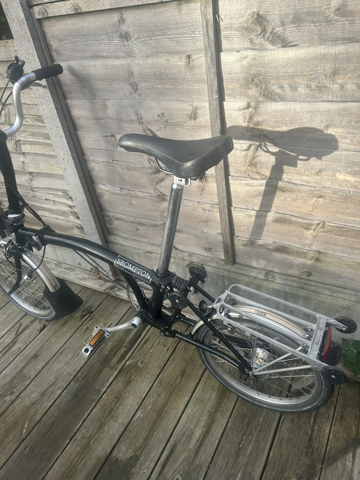 Brompton H3L Black with a rack