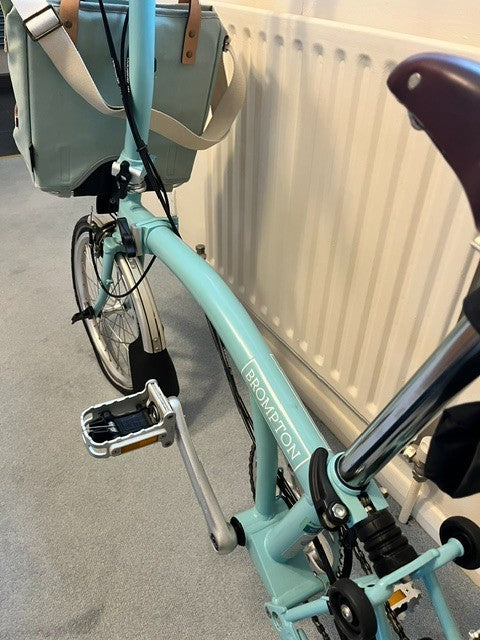 brompton folding bicycle, used twice then stored, immaculate condition.