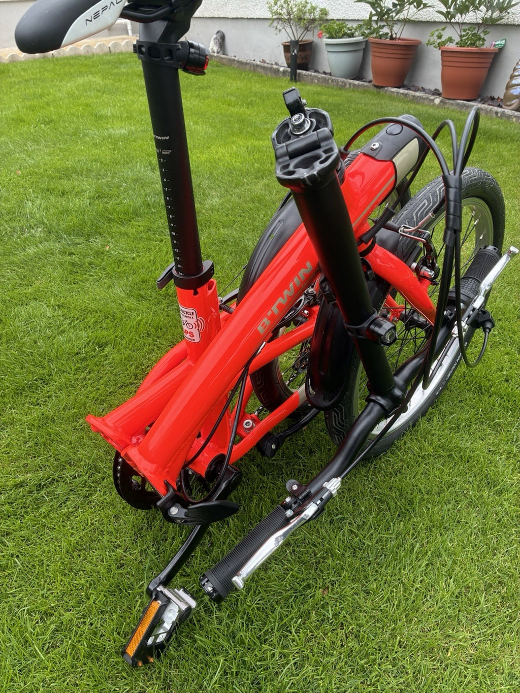 B'TWIN Tilt 500 Folding Bike 20 in Aluminium Red. Also a Cross CRF300.