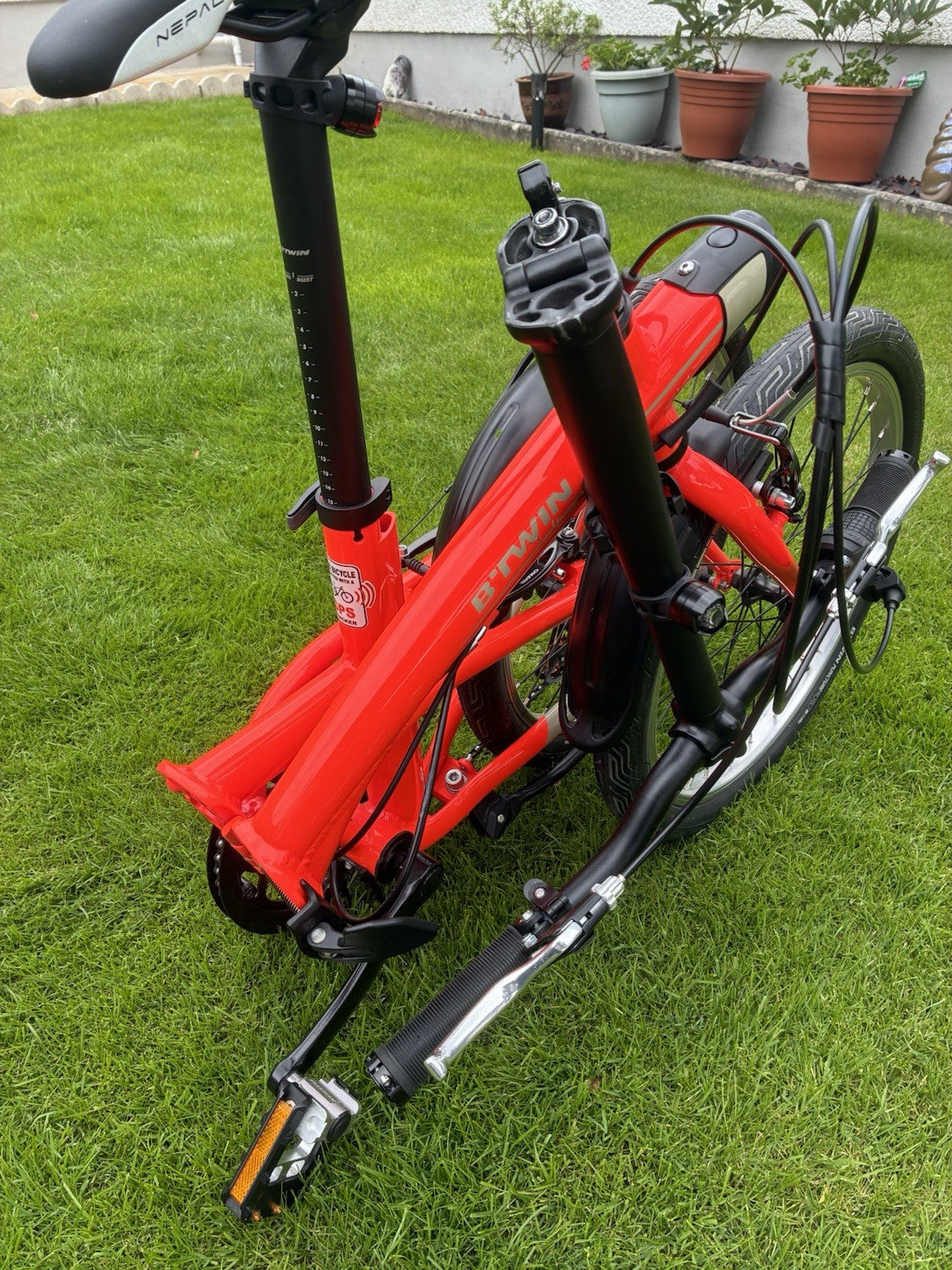 B'TWIN Tilt 500 Folding Bike 20 in Aluminium Red. Also a Cross CRF300.
