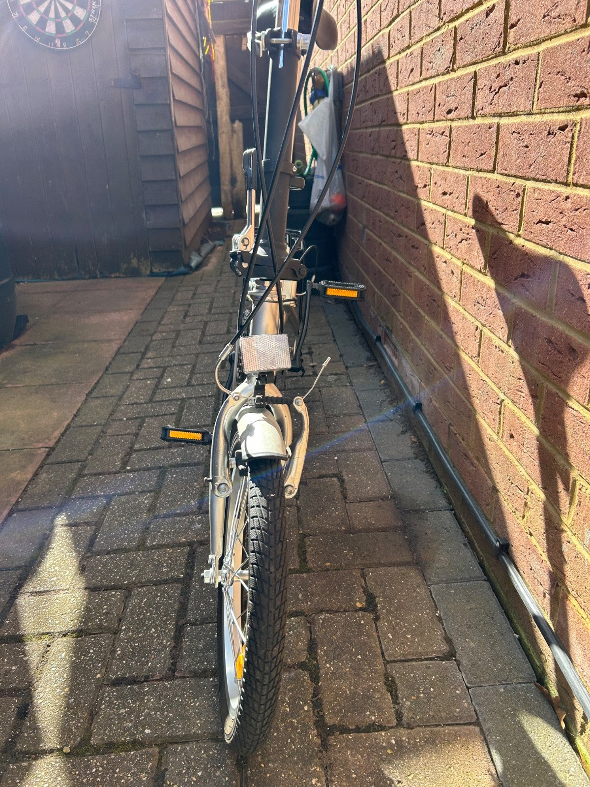 silver unisex fold up bike, aluminium alloy, never used