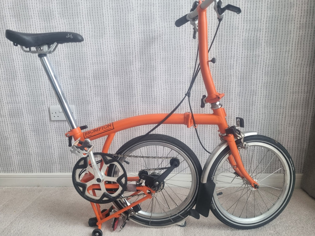 Brompton folding bike in excellent condition, 2-speed 2012 mudguards