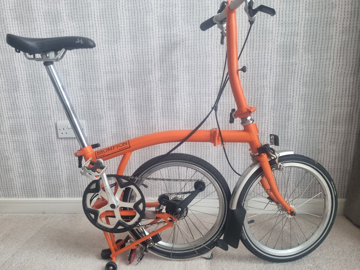 Brompton folding bike in excellent condition, 2-speed 2012 mudguards