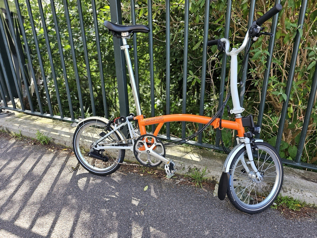 Brompton Folding Bike 16in Wheels Orange/white Silver Mudguards Cruiser Bar