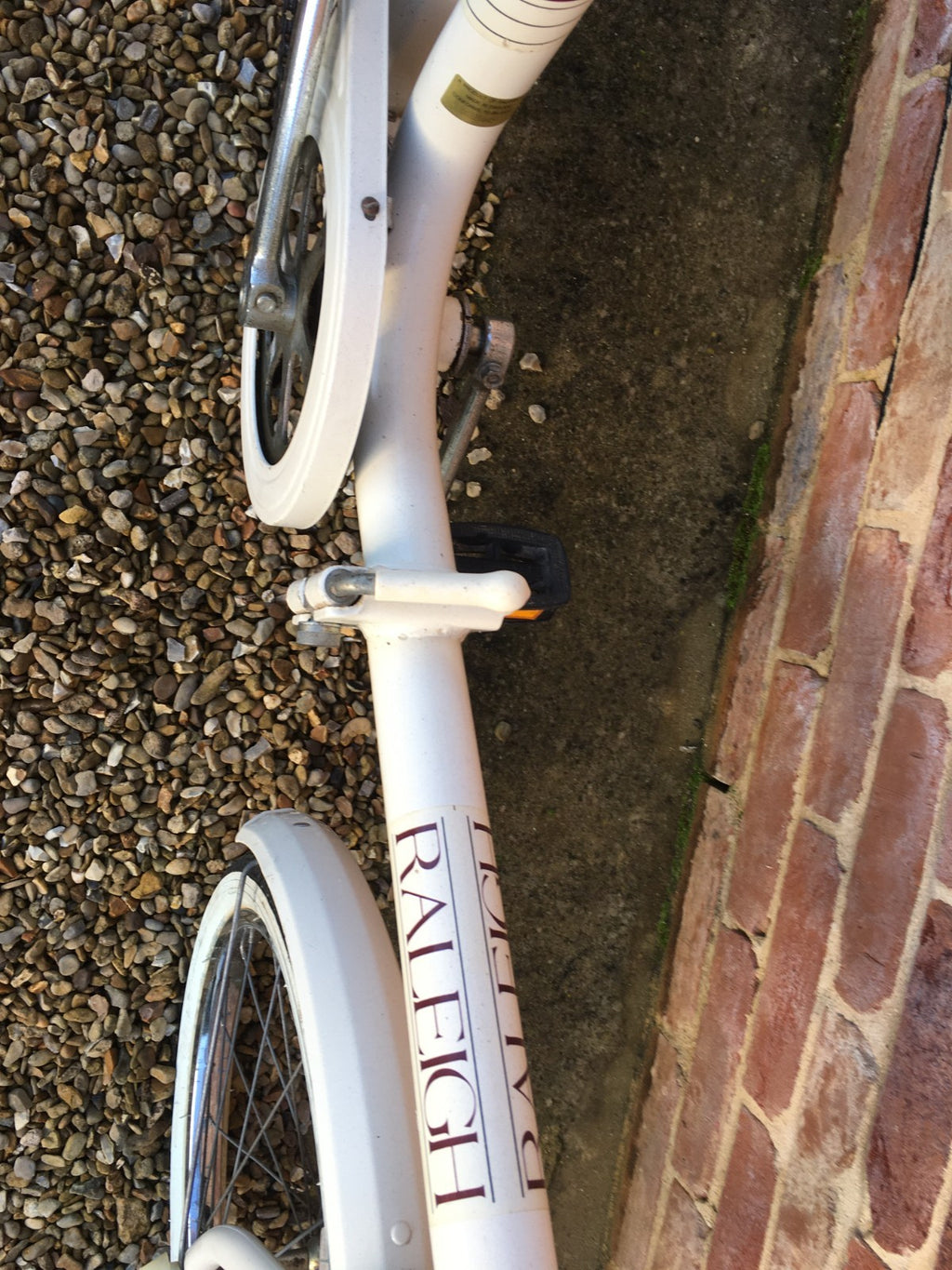 Raleigh Compact white foldable unisex bicycle used,