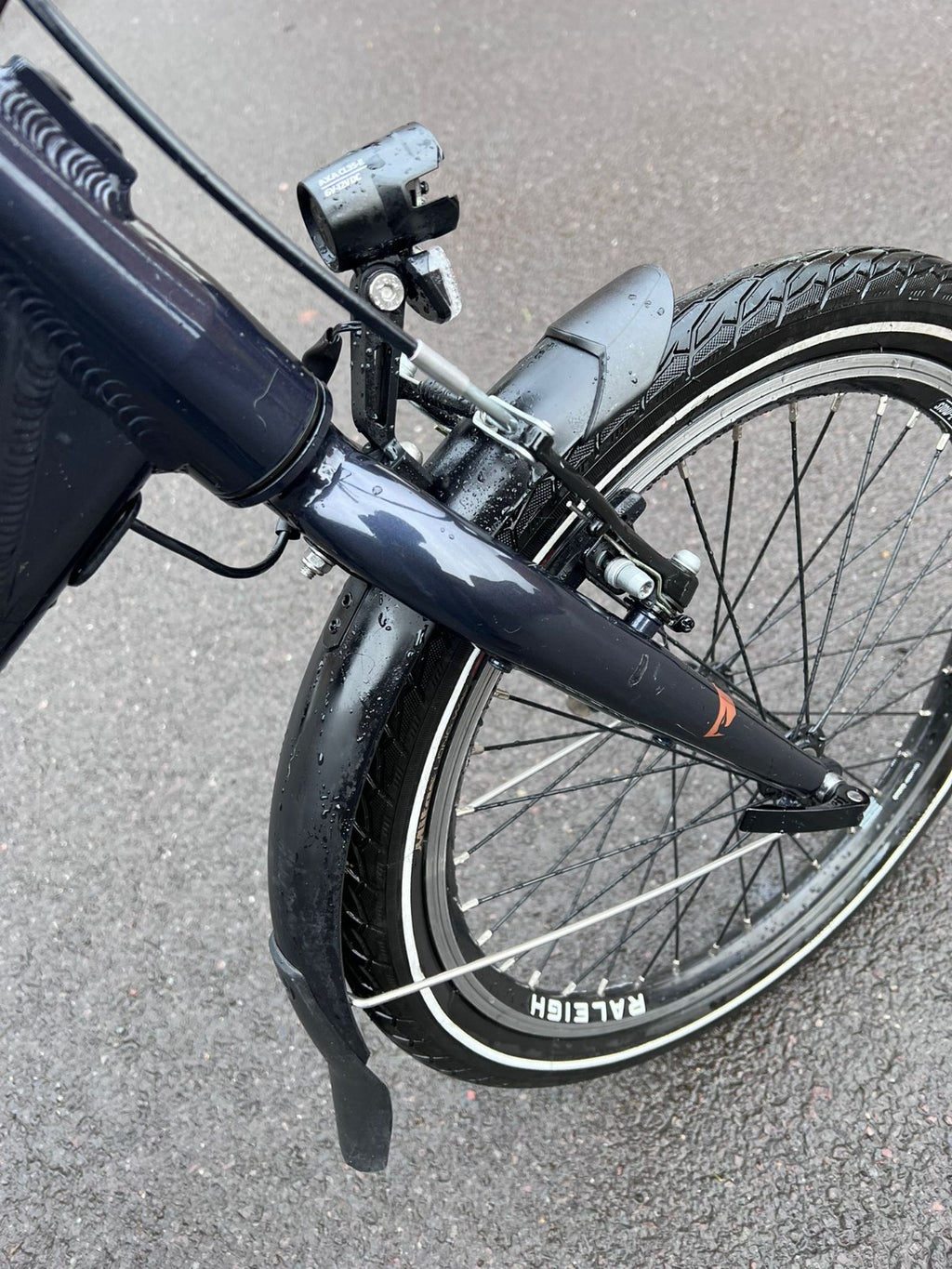 Raleigh Stow-E-Way Folding Bike In Dark Blue Designed to be packed away