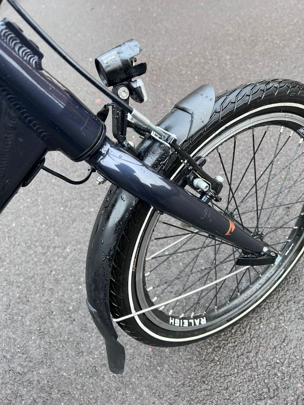 Raleigh Stow-E-Way Folding Bike In Dark Blue Designed to be packed away