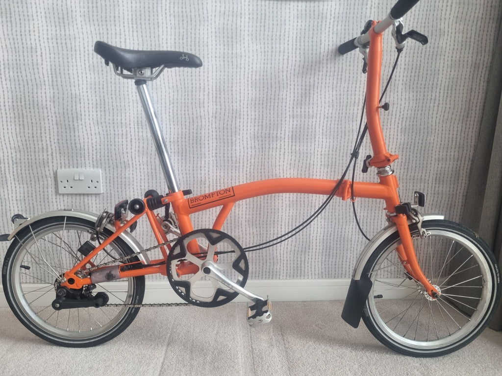 Brompton folding bike in excellent condition, 2-speed 2012 mudguards