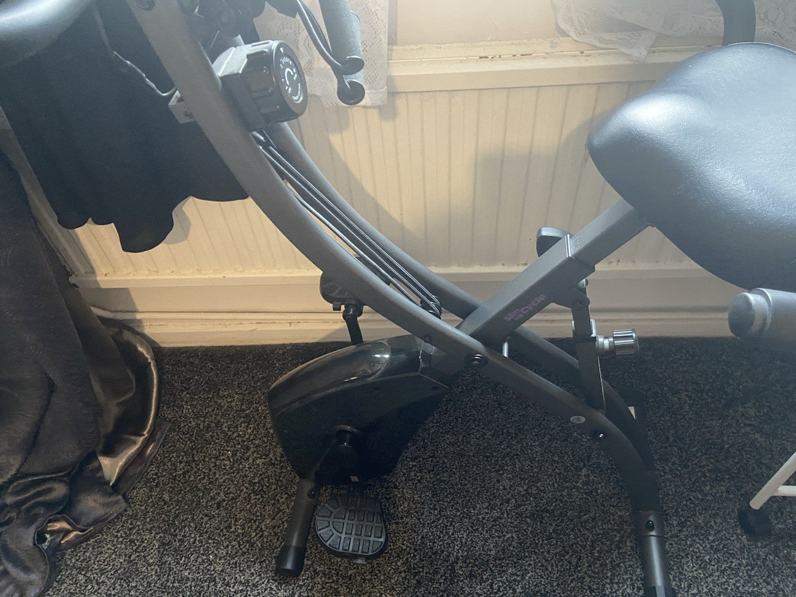 Slim Cycle foldable exercise bike worth over £200. Compact and sturdy