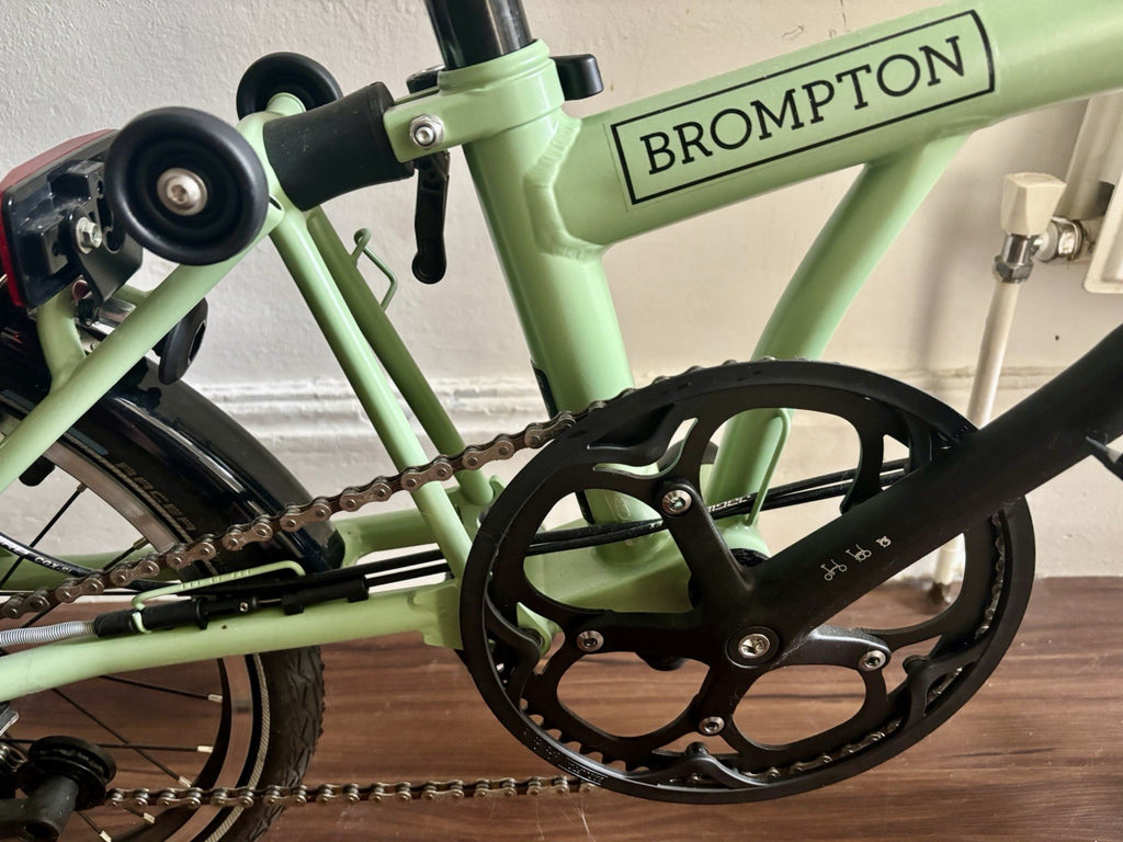 Brompton C Line 2 Speed Matcha Green 2023 with brompton bag and pump