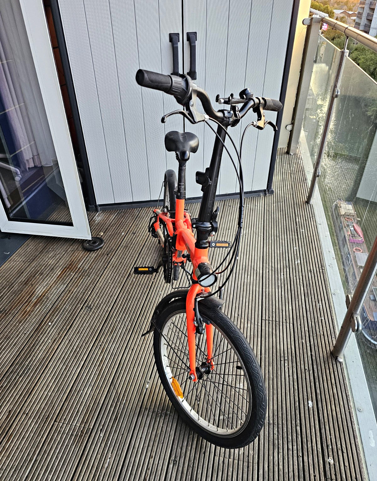BTWIN Folding Bike Tilt 500 - Neon Orange From Decathlon.