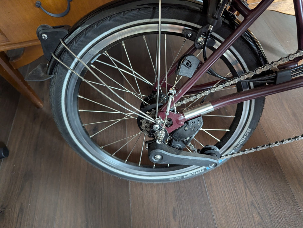 Brompton bike C-line 12-speed 2026 mid bar in Burgundy colour