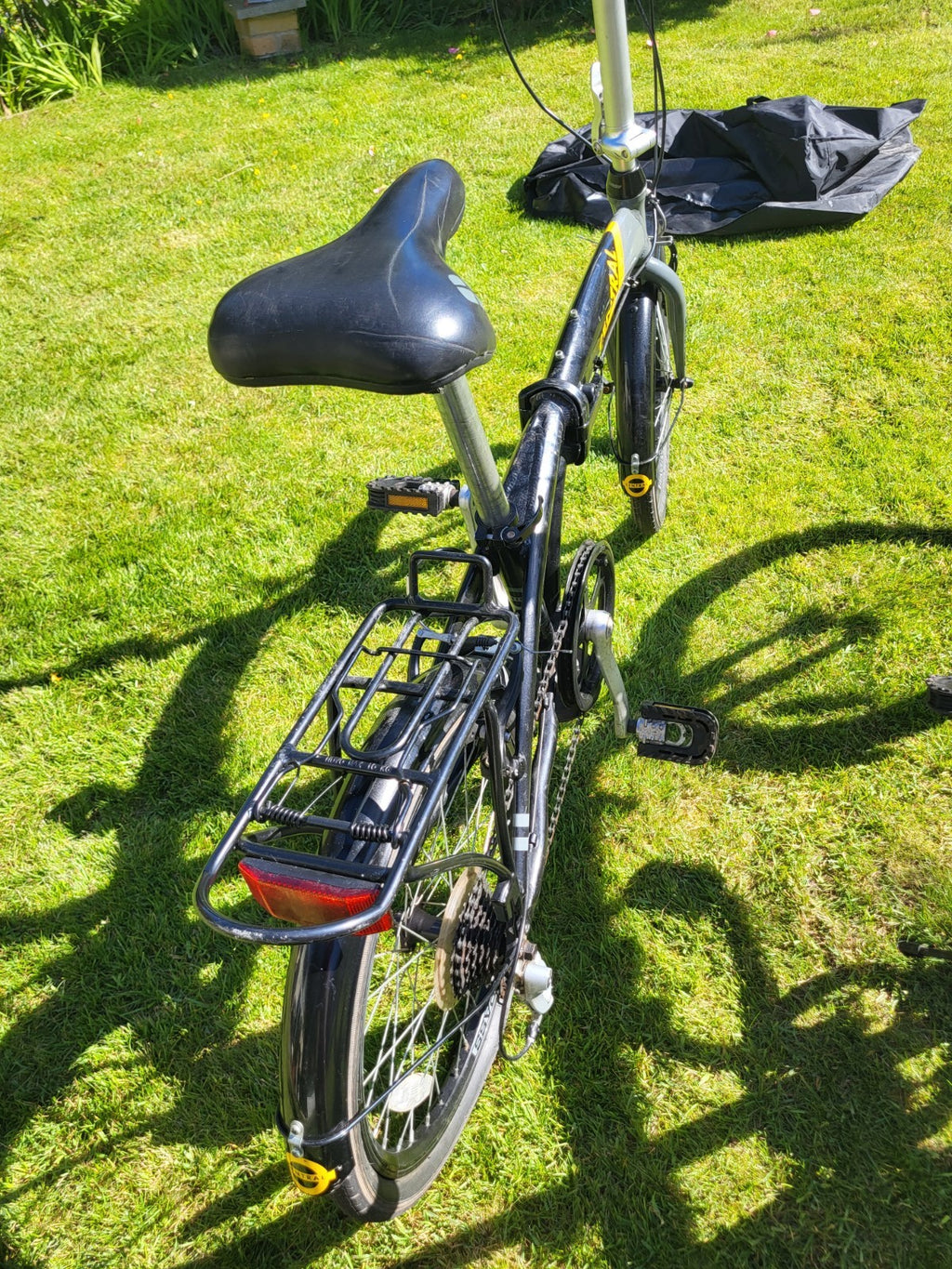 Compass Central  20in Folding Bicycles X  2, one white, one black.