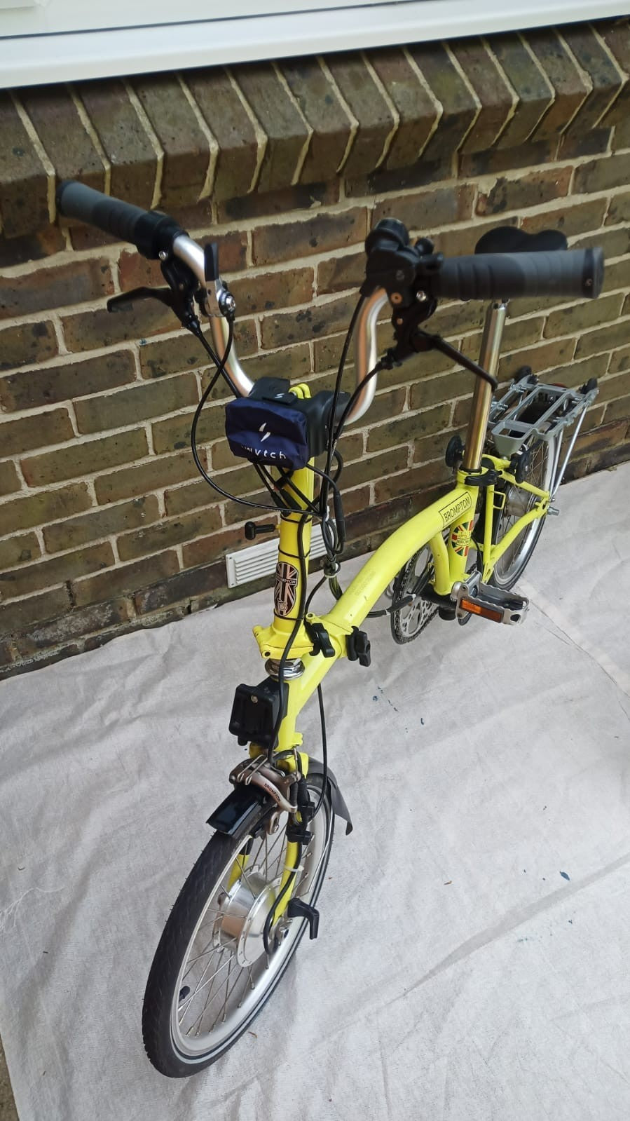 A Pair of Yellow Bromton Bikes In Excellent Condition with Conversion Kit