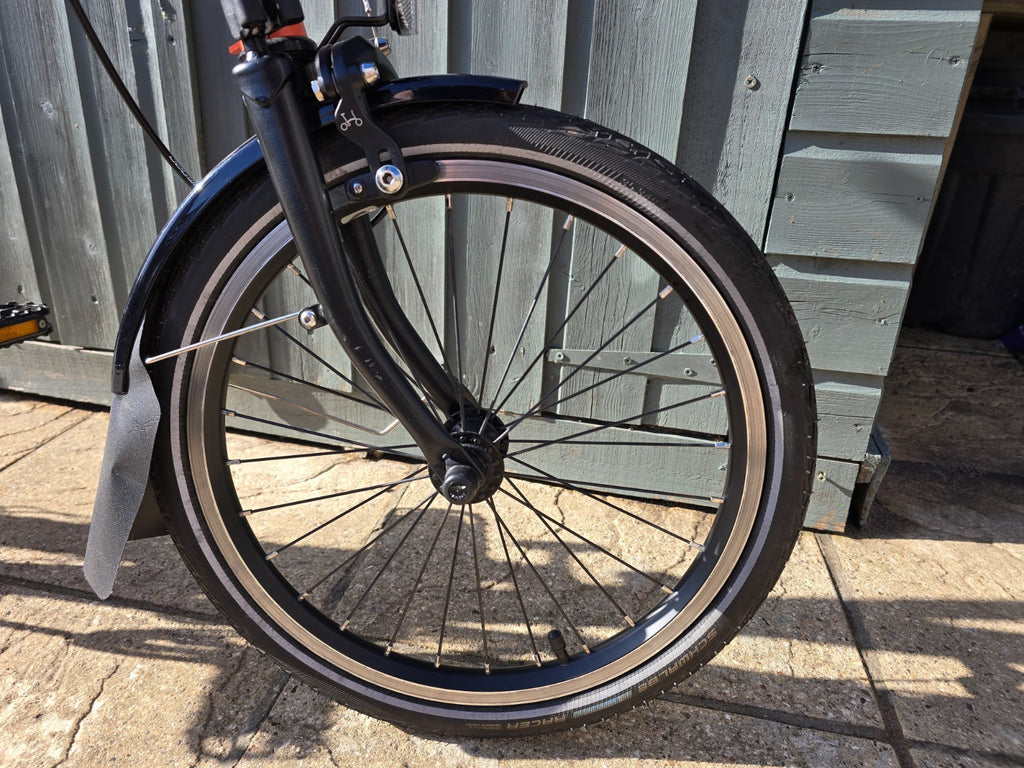 Brompton folding bike, 6 speed, C Line, registered Sept 23, orange