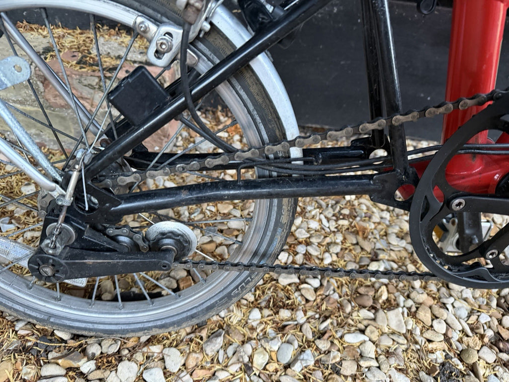 Brompton M3L Folding Bike Red complete with Rack And roll Along Wheels