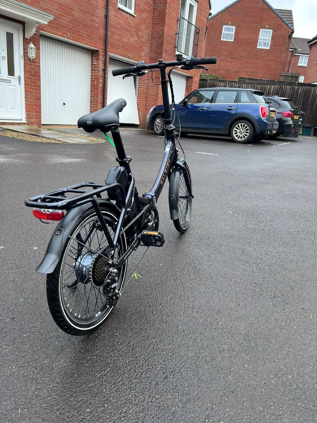 Raleigh Stow-E-Way Folding Bike In Dark Blue Designed to be packed away