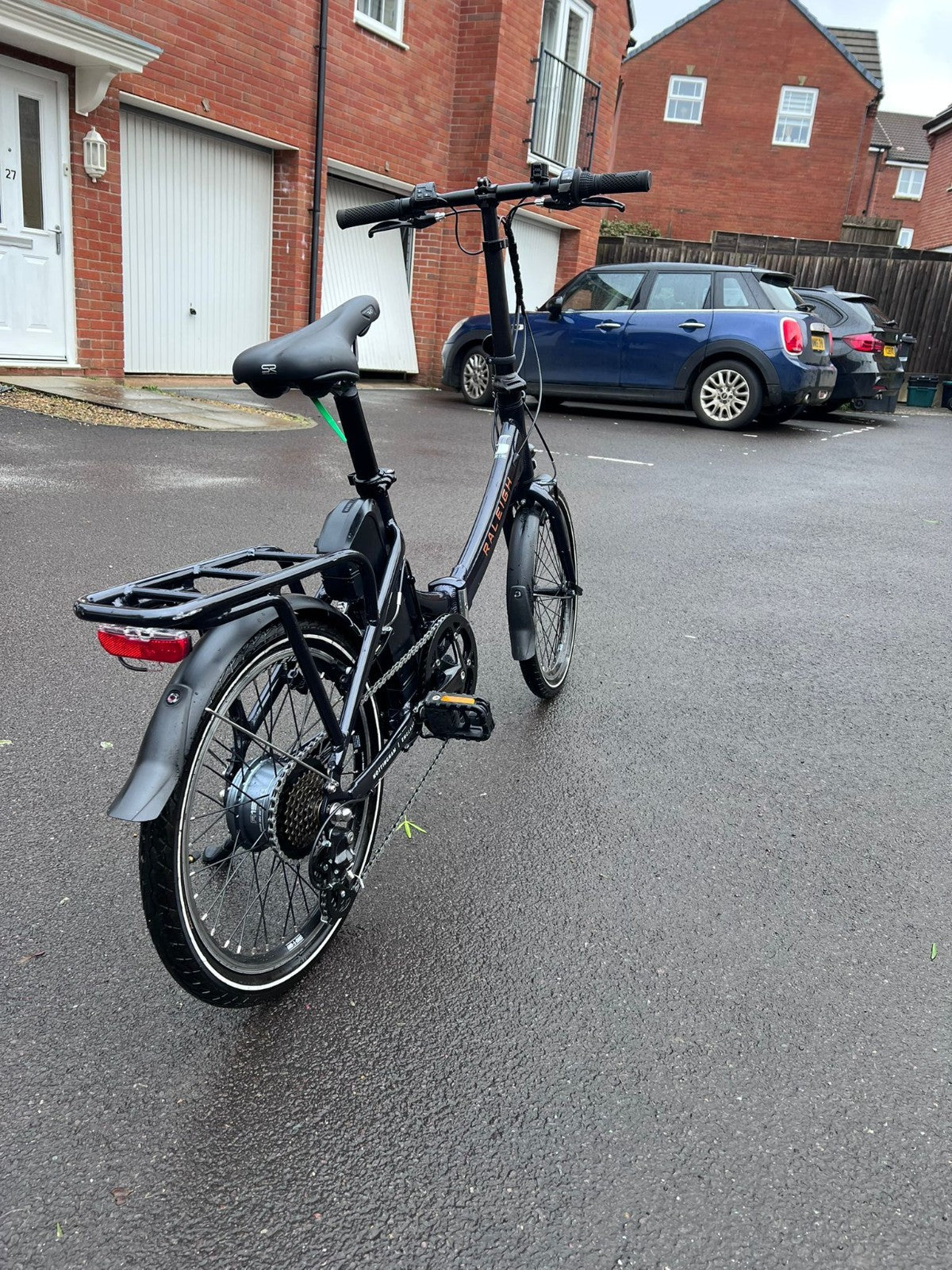 Raleigh Stow-E-Way Folding Bike In Dark Blue Designed to be packed away