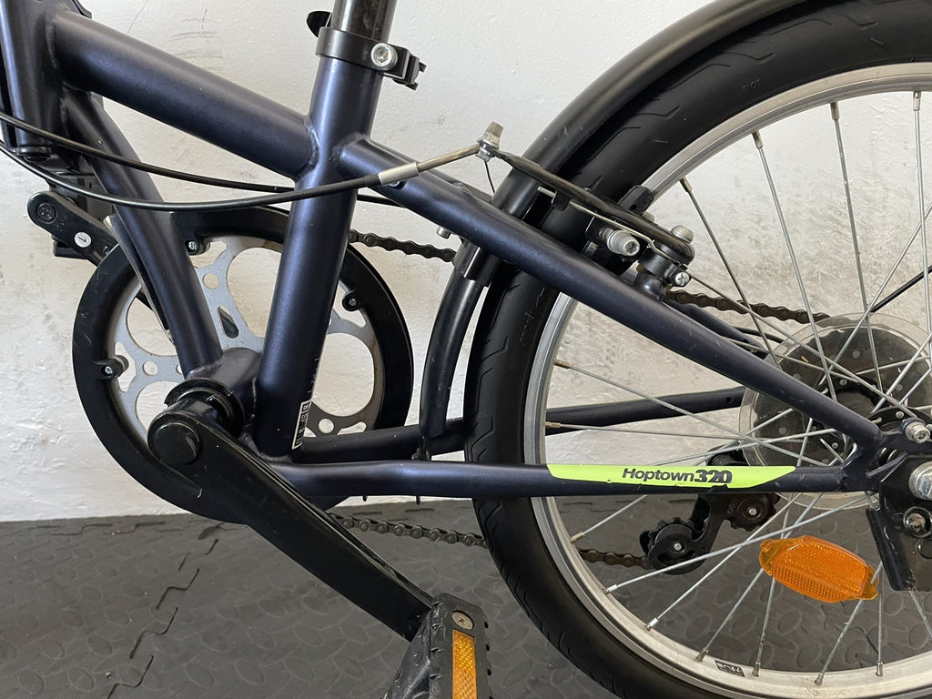 B Twin Tilt 120 Folding Bike 20 Inch Wheels. 6 Speed Matt Navy And Neon.