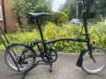 Brompton C Line Explore 6-Speed Black Edition with Mid-Handle Bars 🌏📦