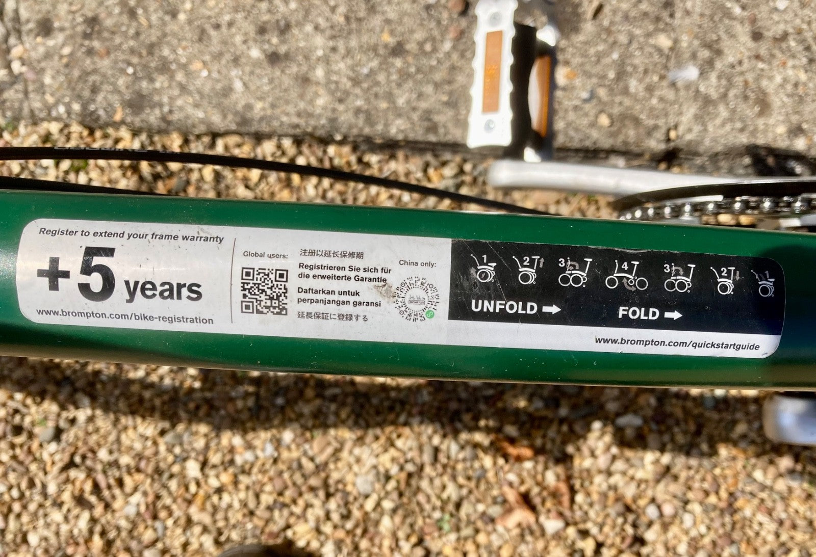 2023 Brompton C line folding bike, 3-speed, green,  with 4-roller transit bag