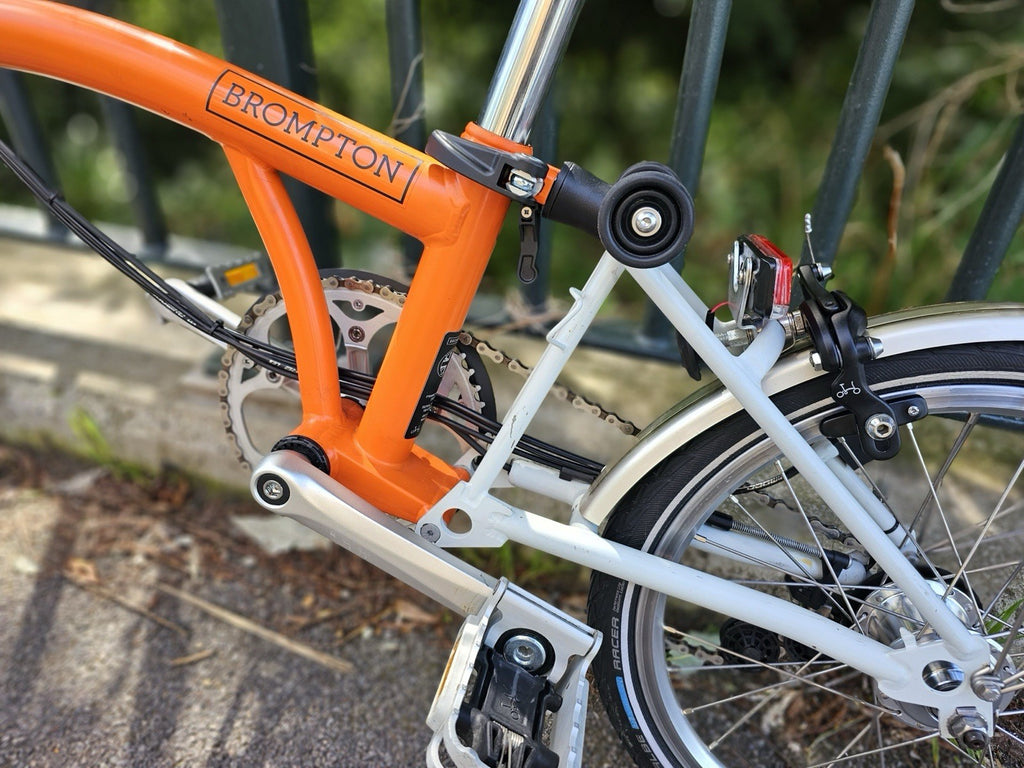 Brompton Folding Bike 16in Wheels Orange/white Silver Mudguards Cruiser Bar