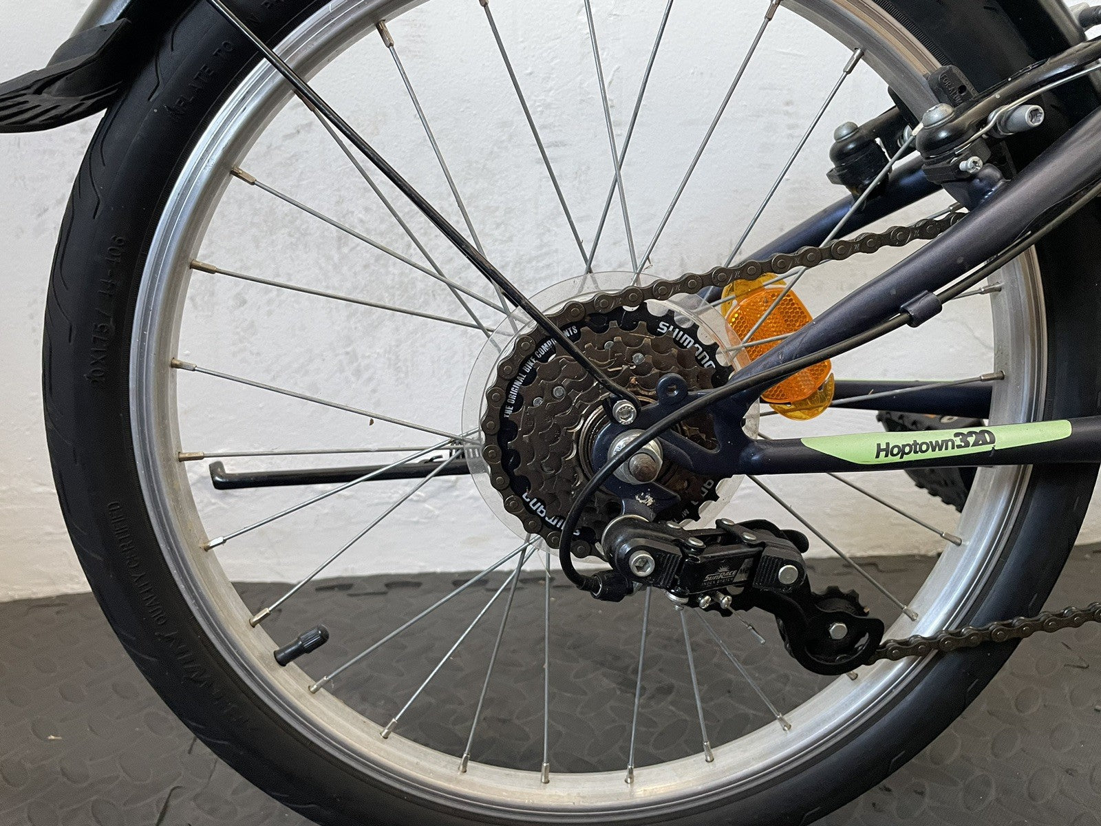 B Twin Tilt 120 Folding Bike 20 Inch Wheels. 6 Speed Matt Navy And Neon.