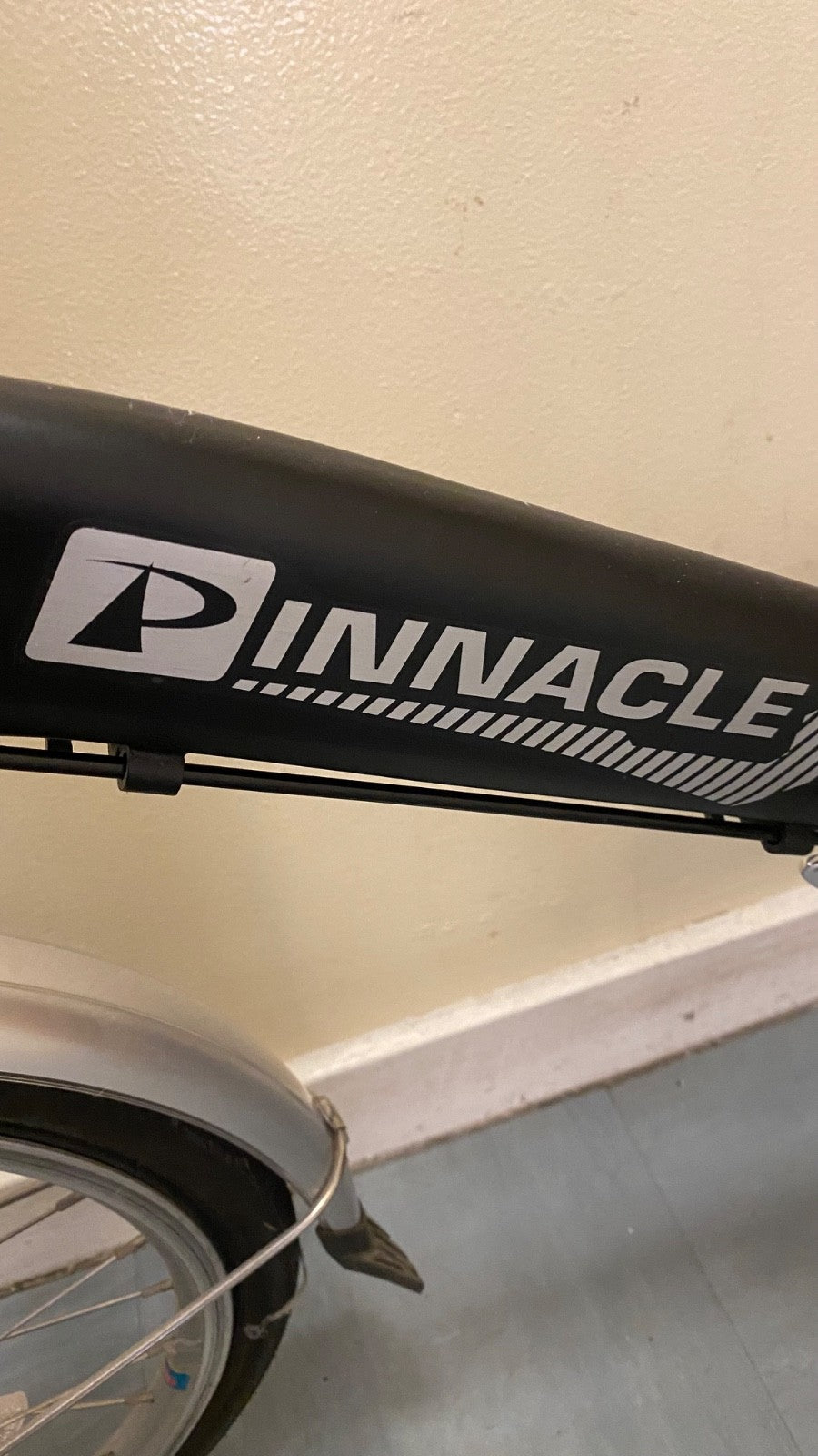 Pinnacle Journey 1.0 folding bike in matte black. Shimano Nexus 3-speed.