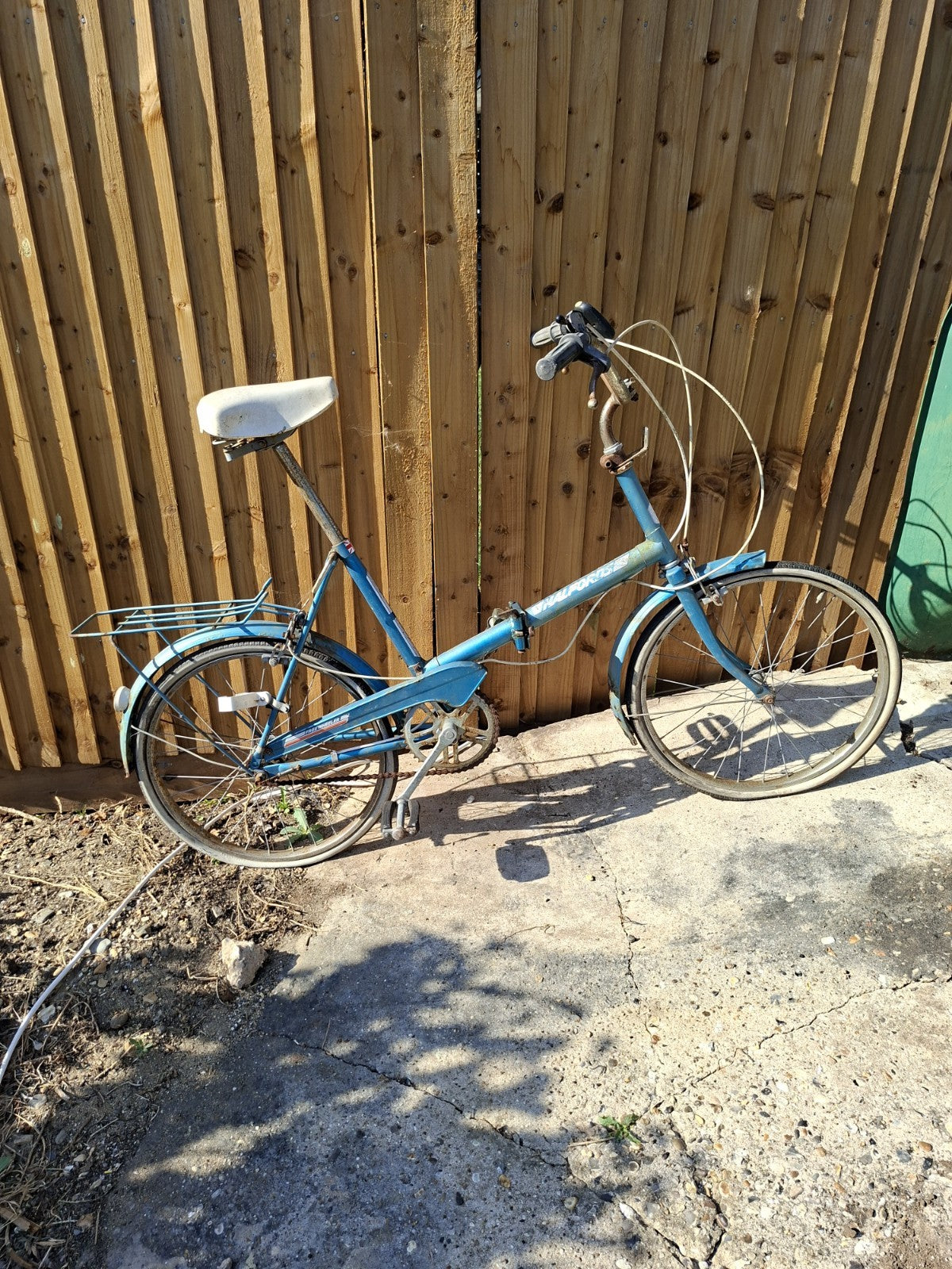 Halfords Blue Folding Bike Step-Through Frame with Rear Rack for Storage