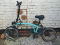Electric fold up Brompton Bike. 4 years old. Only ridden 5 times.