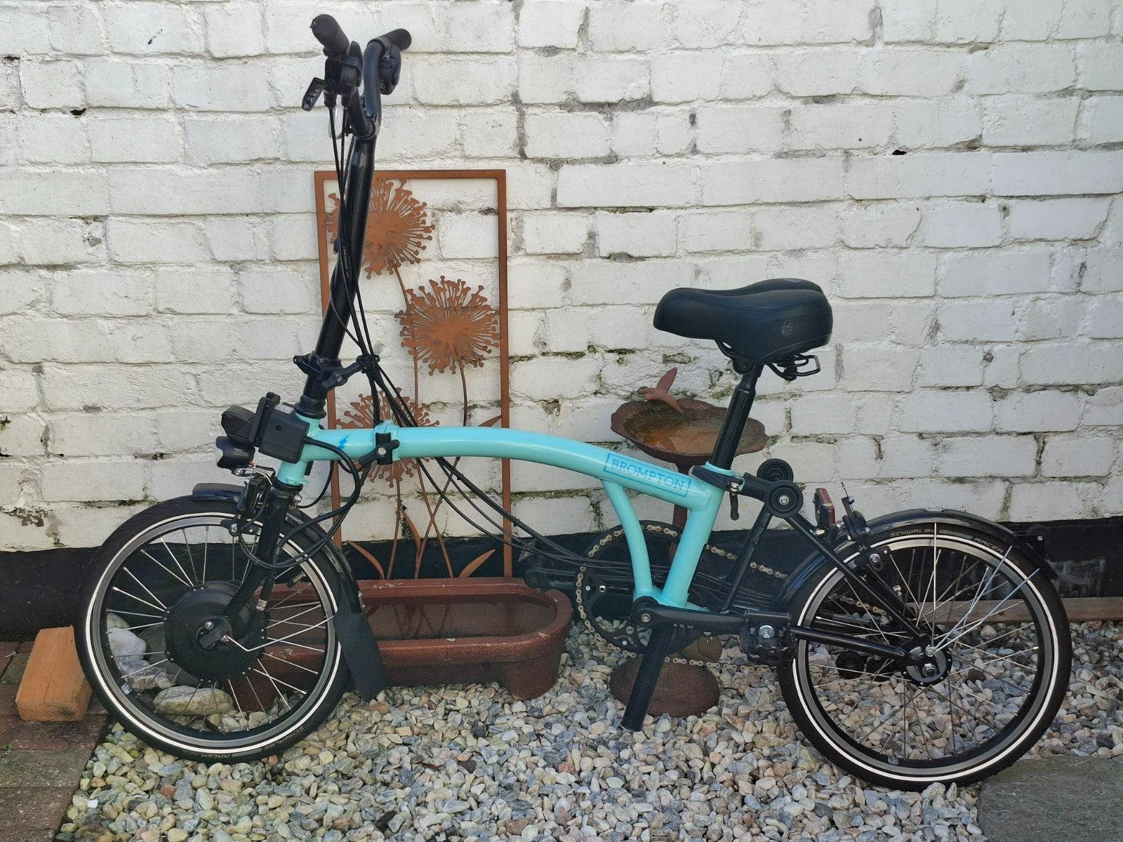 Electric fold up Brompton Bike. 4 years old. Only ridden 5 times.