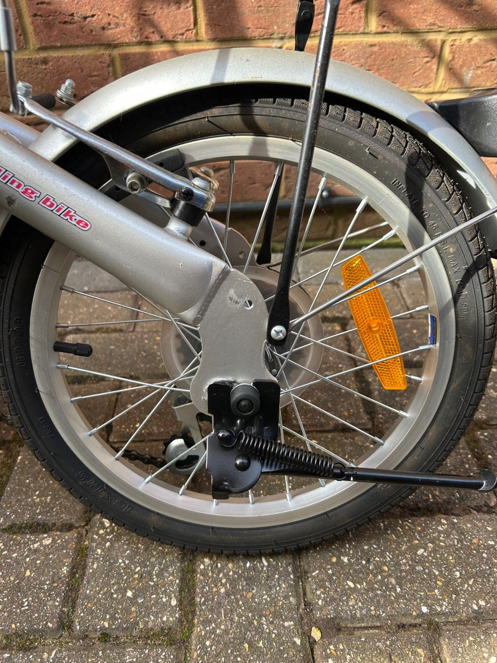 silver unisex fold up bike, aluminium alloy, never used