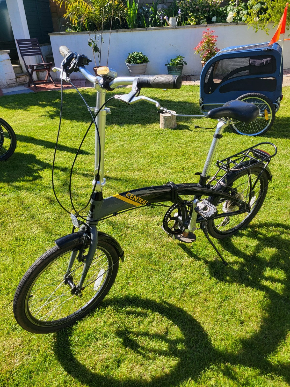 Compass Central  20in Folding Bicycles X  2, one white, one black.