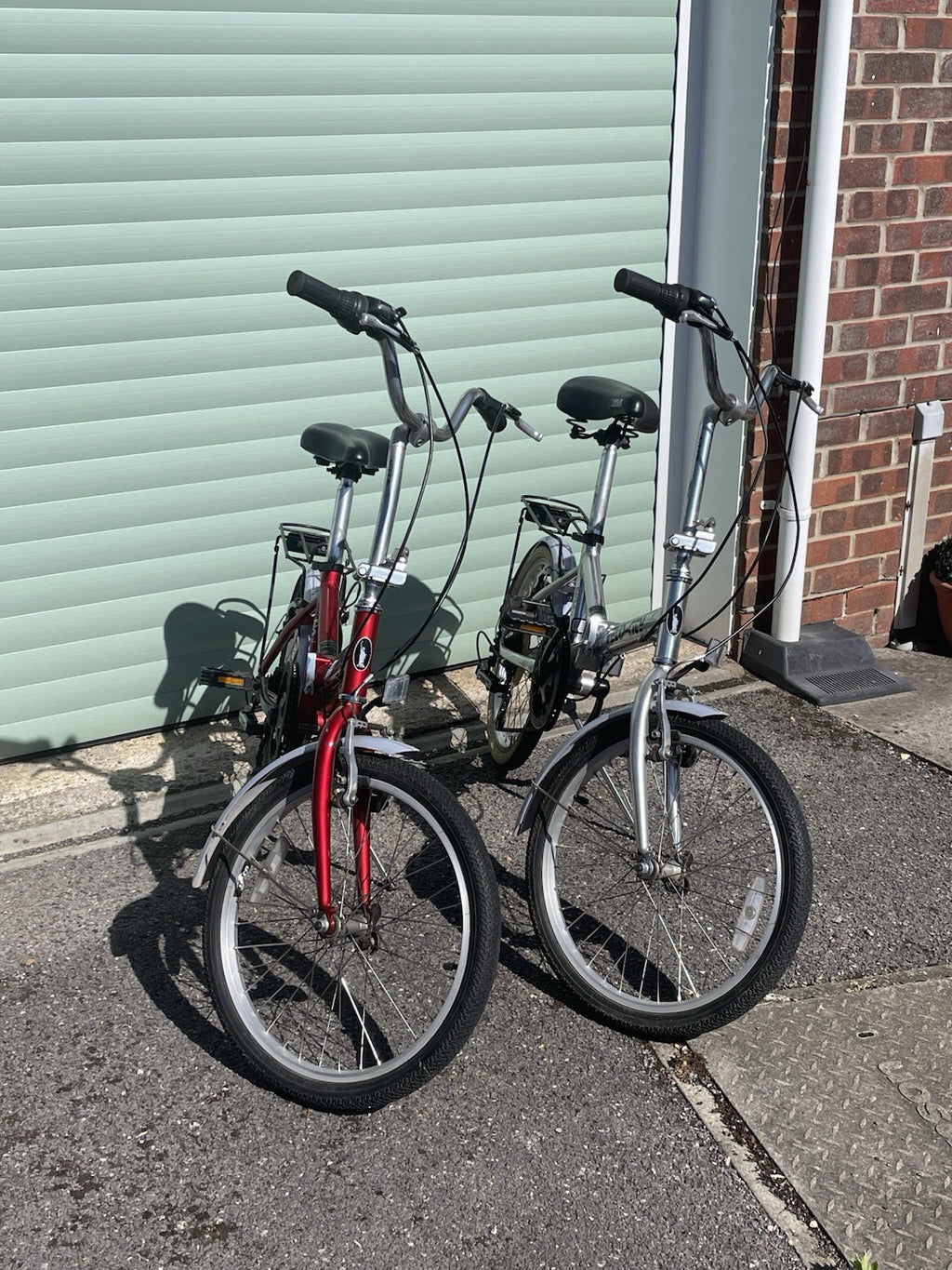 A Pair Of Velo-city 5 Speed Folding Bikes In Good Condition With Bags