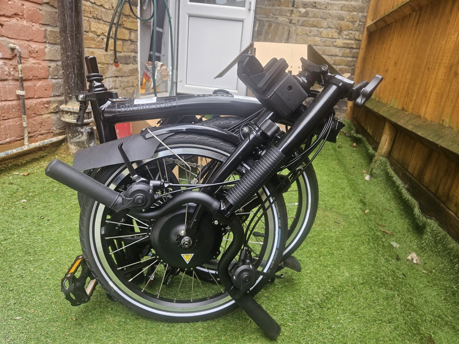 Brompton Electric C Line - 4 Speed - Mid Handlebar  Black Folding Bike