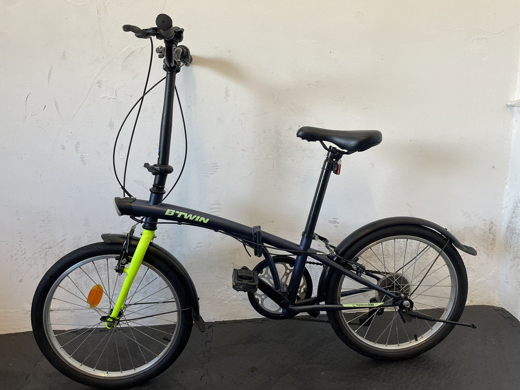 B Twin Tilt 120 Folding Bike 20 Inch Wheels. 6 Speed Matt Navy And Neon.