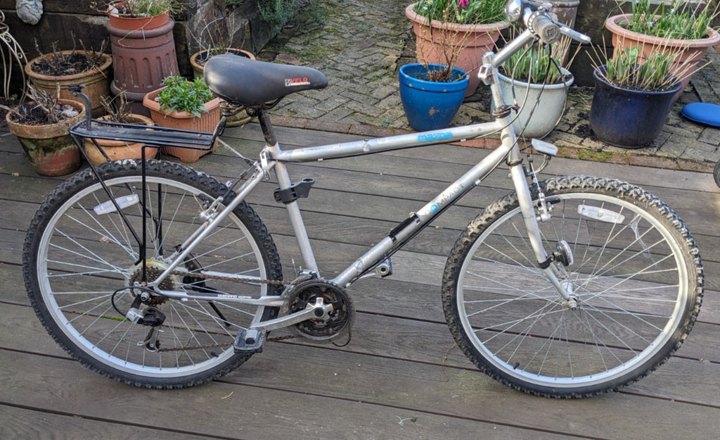 Mazda 26” Compact foldable Town and Country bike.  Minimal use.  Great condition