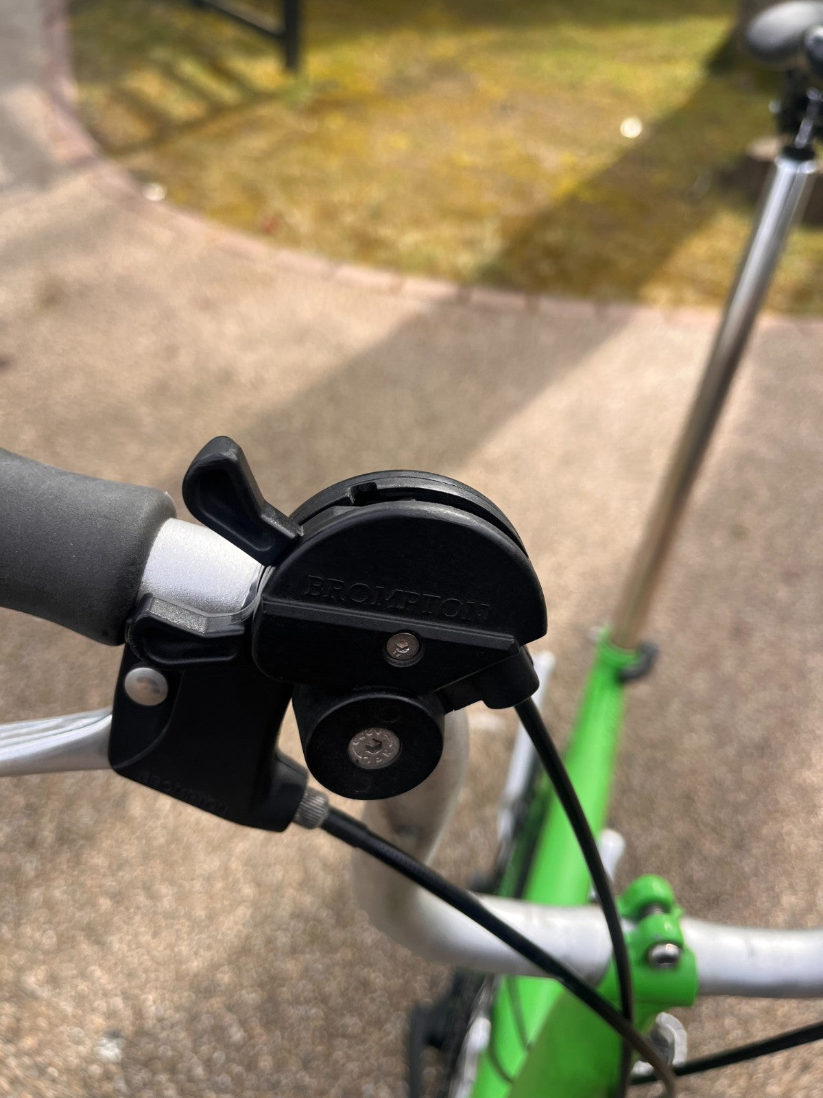 Lime green Brompton folding bike 3 speed