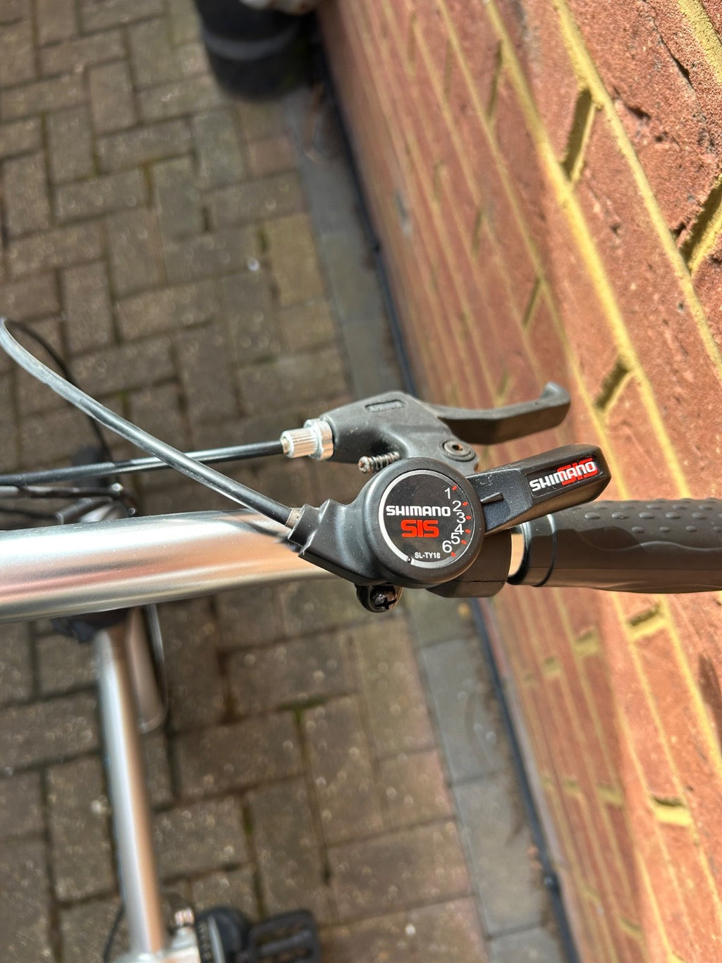 silver unisex fold up bike, aluminium alloy, never used