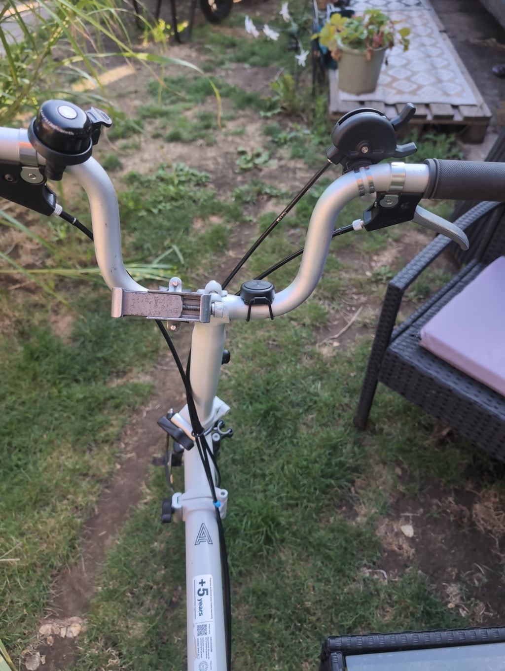 Brompton A line folding bike with led lights and wheel rack.