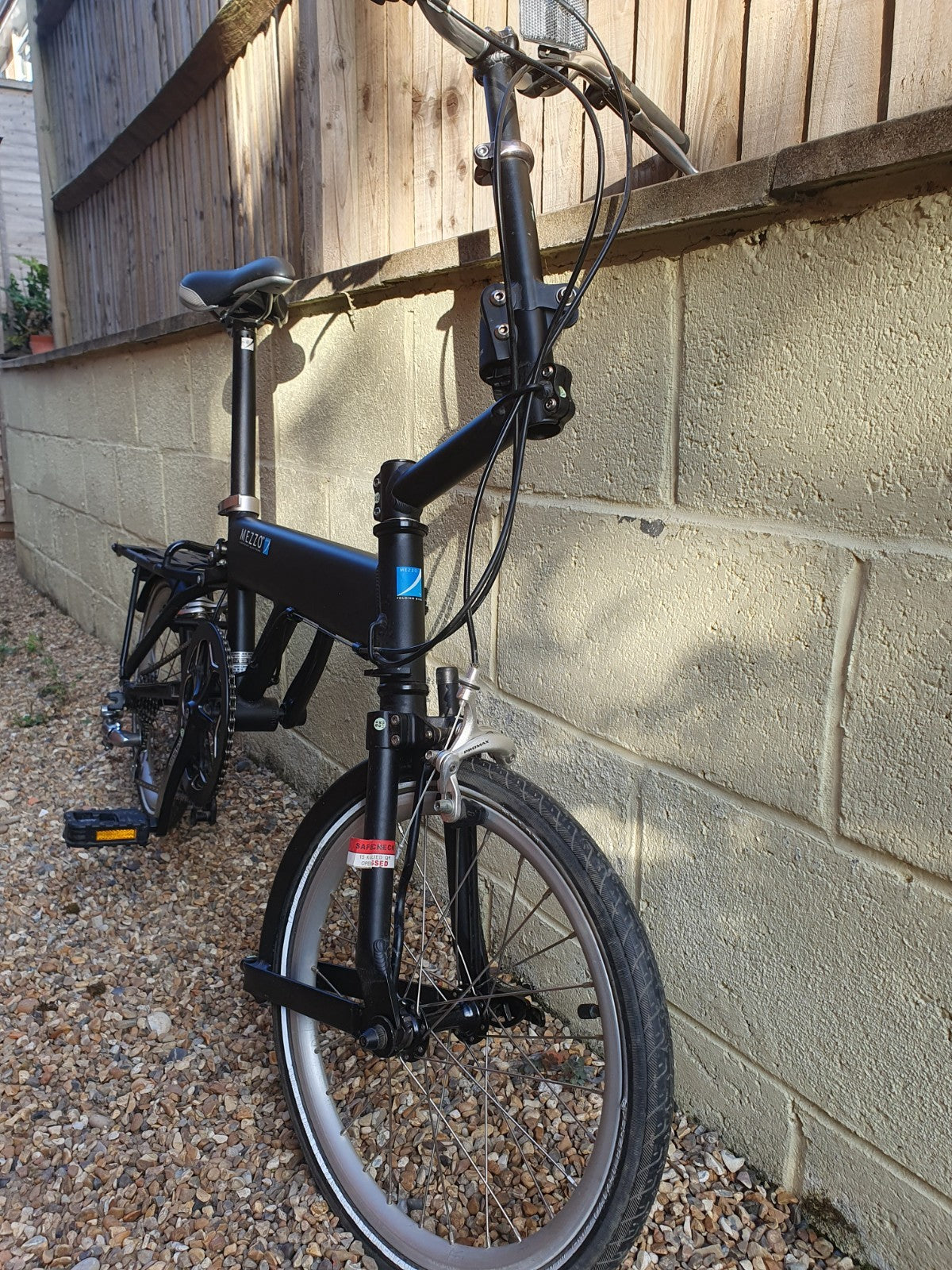 Mezzo D9  9-speed folding bicycle, black, very good condition, with carry bag.