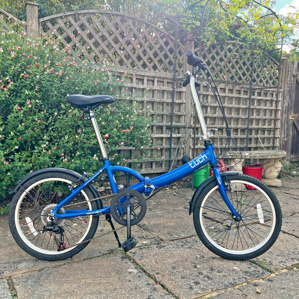 Apollo Tuck Folding Bicycle – Lightweight Steel Frame, 6‑Speed, Compact Fold.