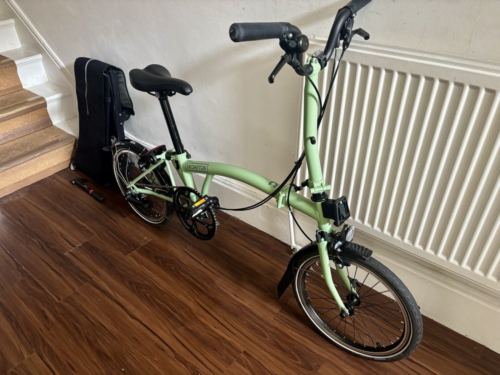 Brompton C Line 2 Speed Matcha Green 2023 with brompton bag and pump