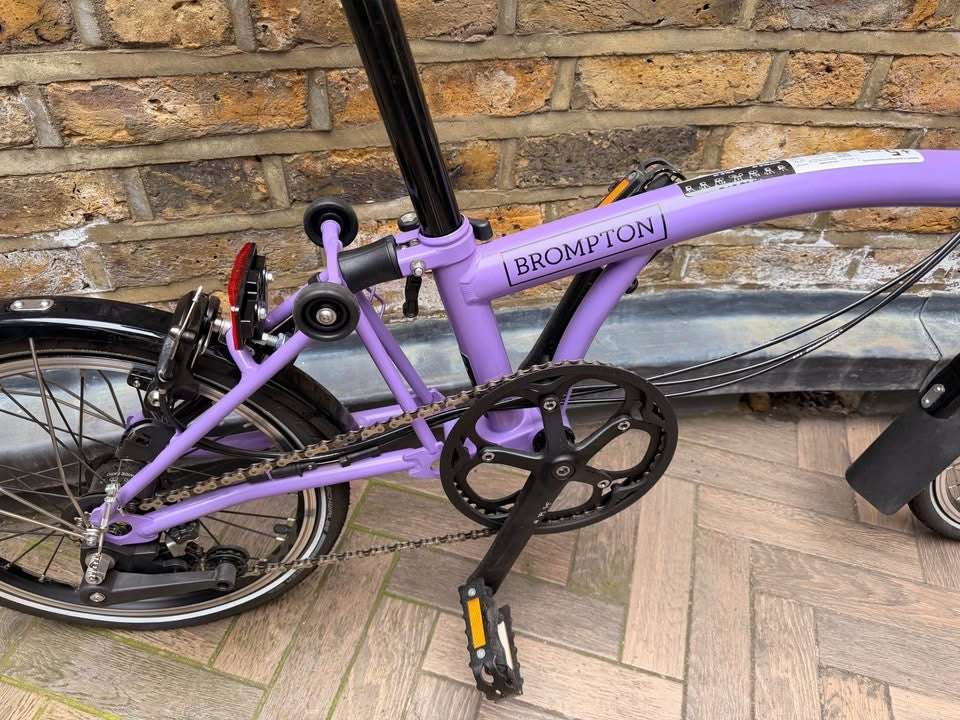 Brompton C Line Explore, 6-Speed, Pop Lilac, Black Ed, Mid Handlebar 2024