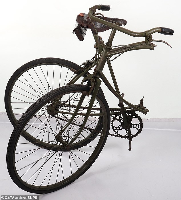 The rare folding bicycle carried by British paratroopers as they parachuted into occupied Normandy on D-Day that has emerged for sale for £8,000, pictured above