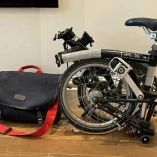 Brompton 6-speed folding bike with Brompton carrier, lights and electric pump